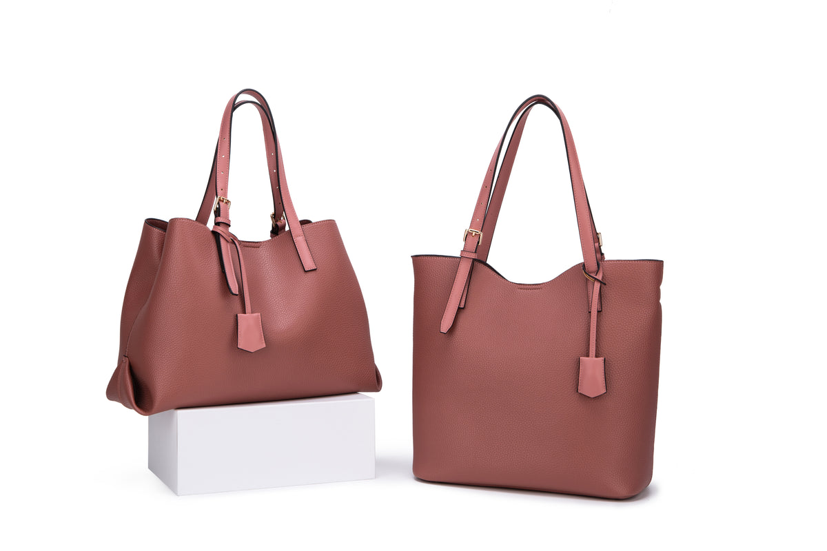Two dusty rose textured totes with adjustable handles and hanging tabs