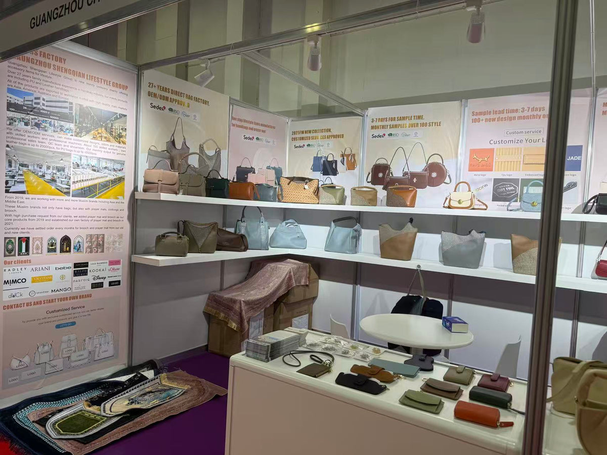 Handbag shelves and a counter displaying wallets, straps and small accessories.