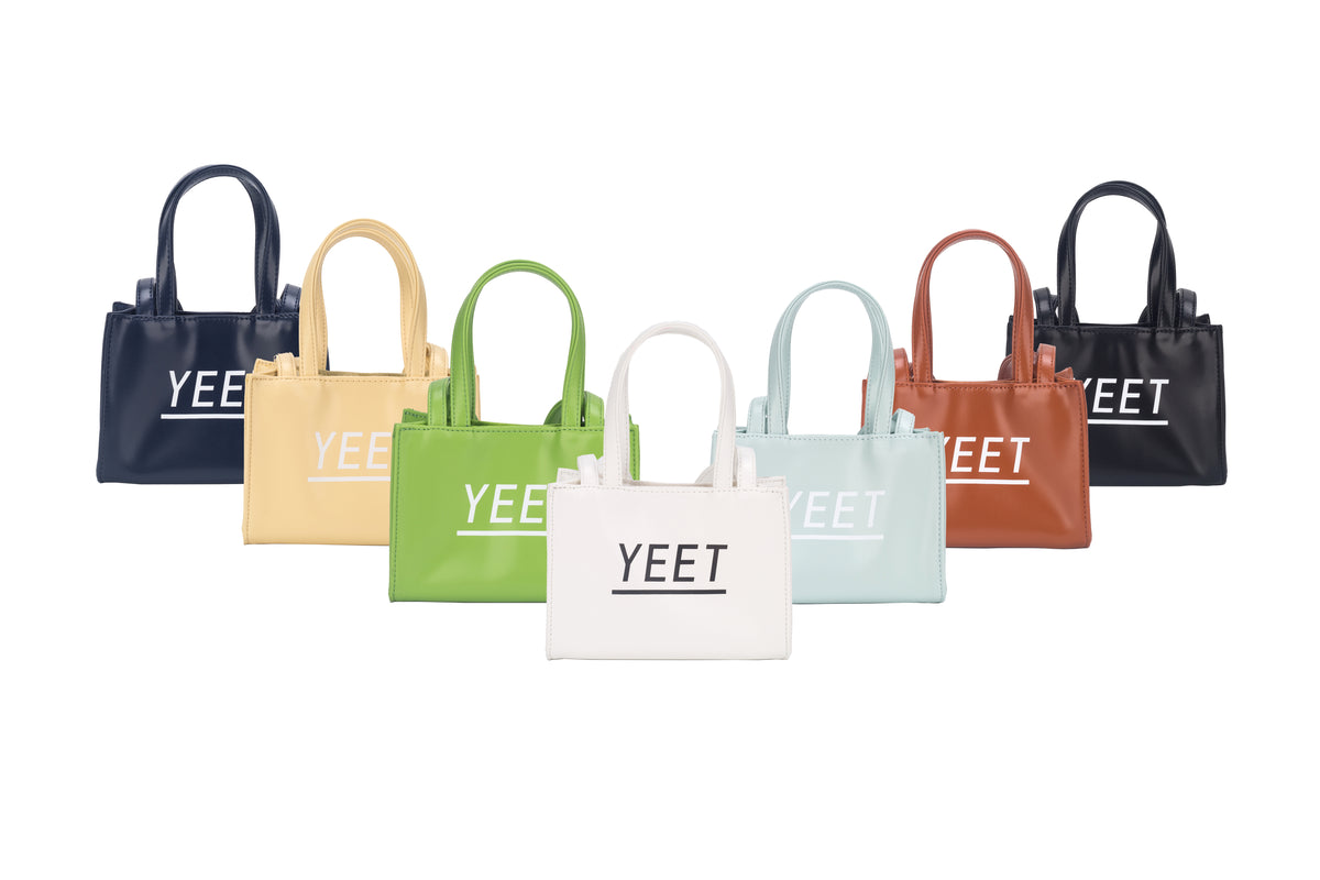 Small top-handle tote bags in seven colours with printed lettering