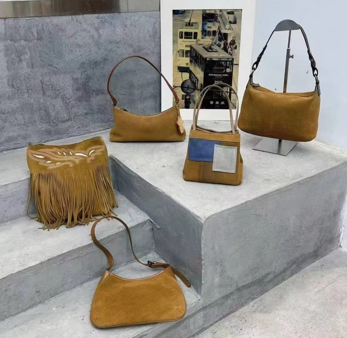 Mustard shoulder and fringe bags in the Sunchain photo collection