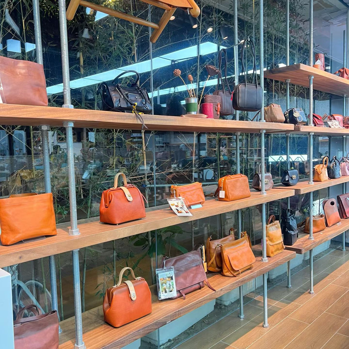 Shoulder bags on shelves in the Sunchain photo collection