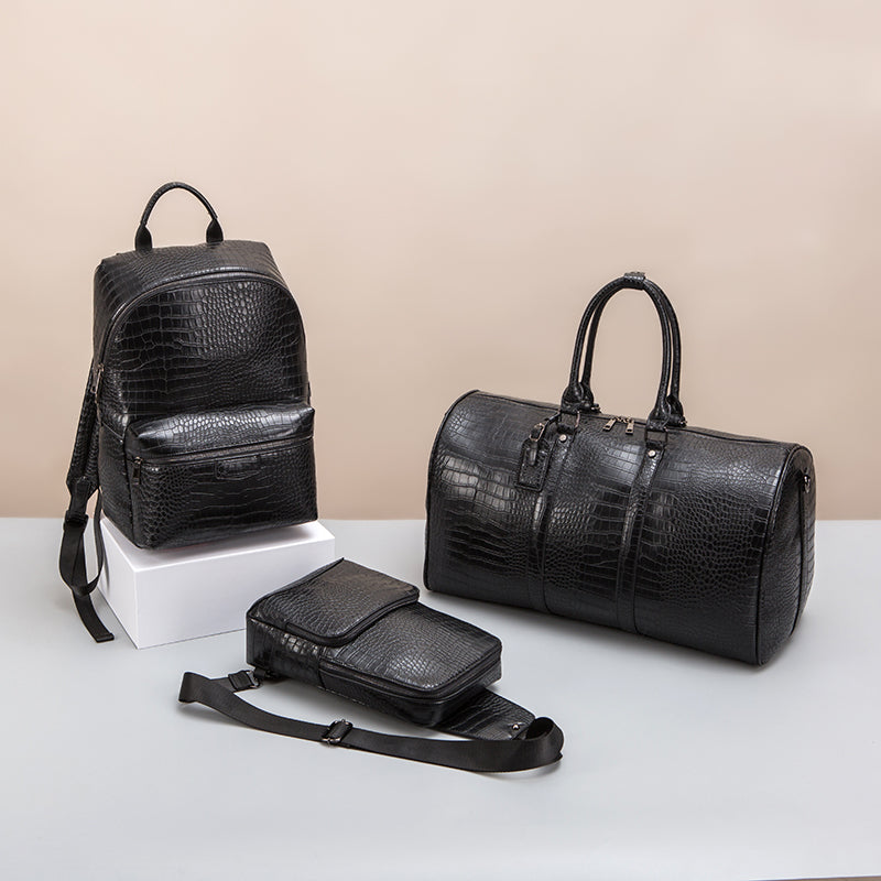 Black croc-effect backpack, duffel and compact sling bag in an alternative arrangement