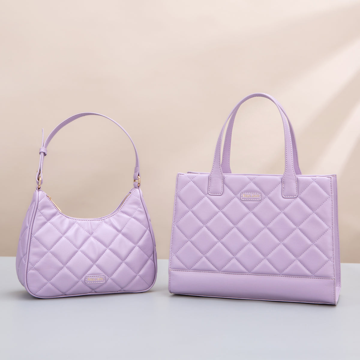 Lilac diamond-quilted hobo and tote bags with matching label details