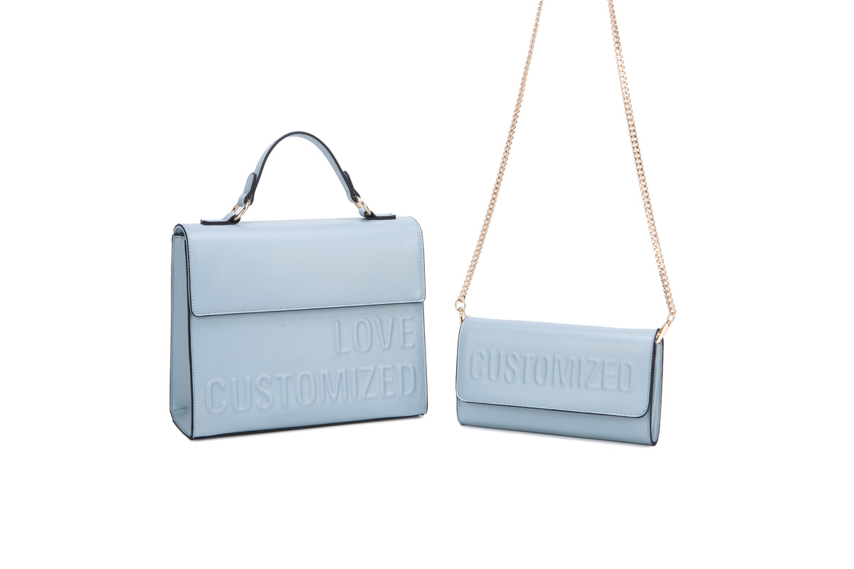 Pale blue top-handle flap bag and chain-strap bag with embossed lettering