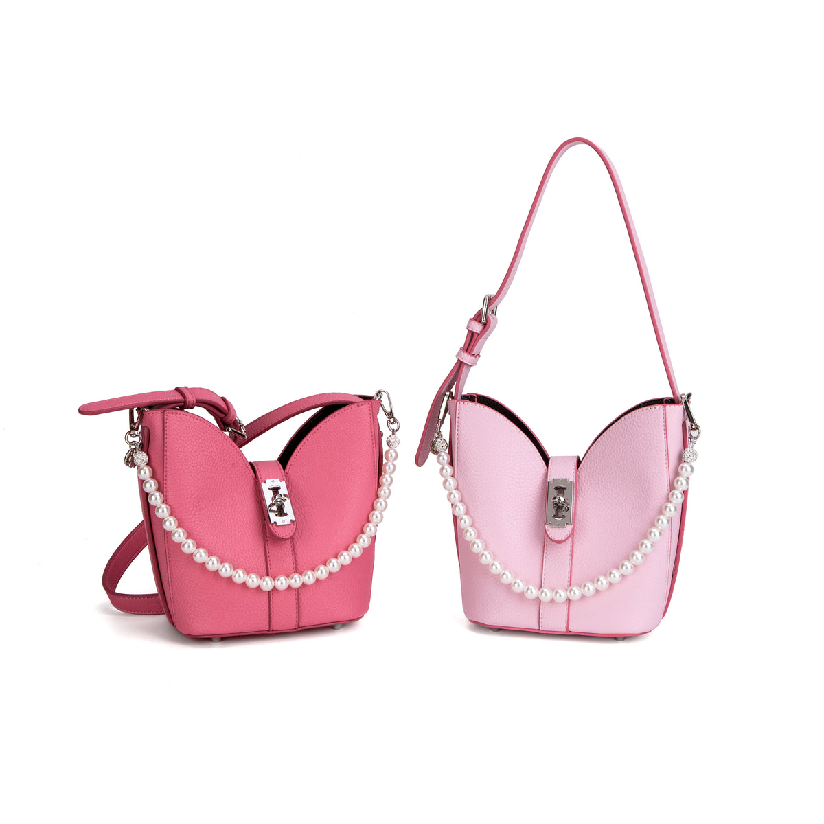Two pink bucket bags with pearl-like chains and front clasp details